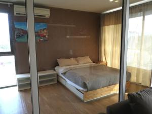 Ένα ή περισσότερα κρεβάτια σε δωμάτιο στο บ้านแสนคราม หัวหิน Baan Sankraam Hua Hin Condominium +23 φωτογραφίες