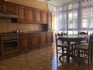 Kuchyňa alebo kuchynka v ubytovaní Casa Castillo Finisterre