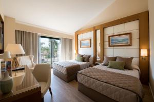Cama o camas de una habitación en PortAventura Hotel PortAventura - Includes unlimited access to PortAventura Park & 1 access to Ferrari Land