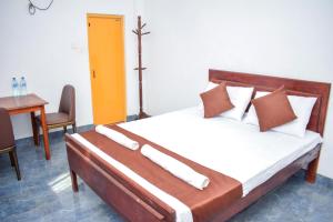 Postel nebo postele na pokoji v ubytování Lion Resort