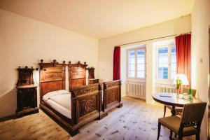 Ένα ή περισσότερα κρεβάτια σε δωμάτιο στο Historic Hotel Albrici