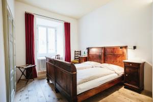 Ένα ή περισσότερα κρεβάτια σε δωμάτιο στο Historic Hotel Albrici