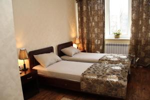 Postel nebo postele na pokoji v ubytování Hotel Meduza