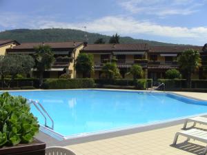 Bazén v ubytování appartamento Luisa al lago d'Iseo nebo v jeho okolí + 18 fotografií