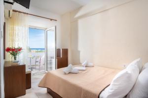 Postel nebo postele na pokoji v ubytování Hotel Stefani