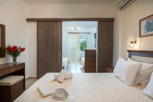 Postel nebo postele na pokoji v ubytování Hotel Stefani