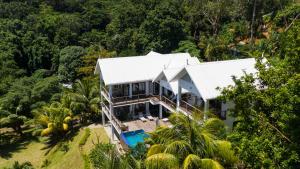 an aerial view of a house in the forest at Coconut Climb in Mahe