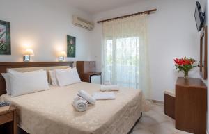 Postel nebo postele na pokoji v ubytování Hotel Stefani