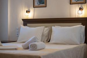 Postel nebo postele na pokoji v ubytování Hotel Stefani