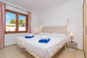 A bed or beds in a room at Garballons 5 1D