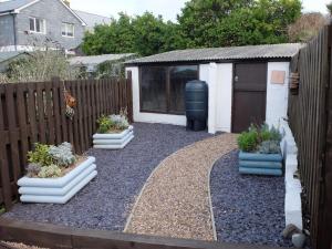 En have udenfor The Keep Pot + 2 billeder