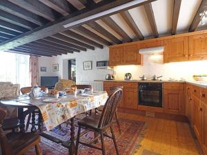 Kuchyň nebo kuchyňský kout v ubytování Foel Stable Cottage