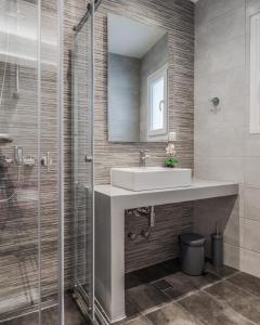 Koupelna v ubytování Poseidonio Hotel + 37 fotografií