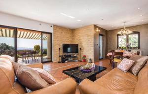 Televízia a/alebo spoločenská miestnosť v ubytovaní Sea View - Casa di Arijana