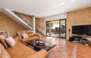 Televízia a/alebo spoločenská miestnosť v ubytovaní Sea View - Casa di Arijana