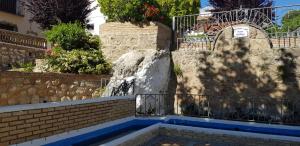 Der Swimmingpool an oder in der Nähe von Vivienda rural fuente de los gusarapos