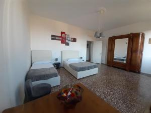 Posteľ alebo postele v izbe v ubytovaní Sunrise Apartment in Giudecca + 2 fotografie