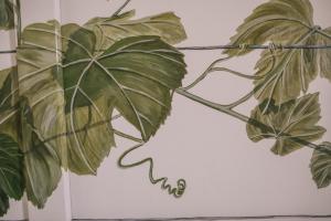 a drawing of a plant on a wall at Ca' Colomba in San Damiano dʼAsti