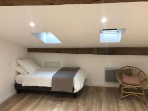Maison Simonenia客房内的一张或多张床位