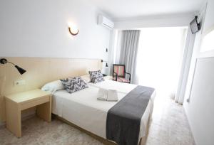 
Cama o camas de una habitación en Hotel Teide
