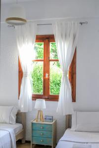 Ένα ή περισσότερα κρεβάτια σε δωμάτιο στο Beachfront deluxe apt.