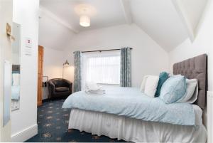 Ένα ή περισσότερα κρεβάτια σε δωμάτιο στο Dolafon Guest House
