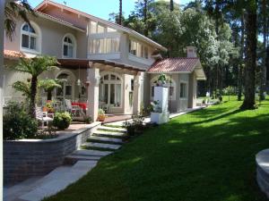 Um jardim em Doce Canela - Pousada de Charme