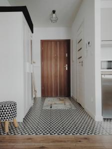 Kuchyňa alebo kuchynka v ubytovaní ForRest Apartment Krynica