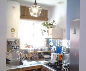 Kuchnia lub aneks kuchenny w obiekcie Apartamentos Málaga Centro Hernán Ruiz de 4 a 8 Personas