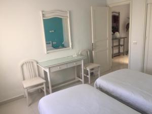 Posteľ alebo postele v izbe v ubytovaní DARUMA APARTMENTS 3-Bedroom Penthouse with Sea Views