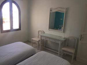 Posteľ alebo postele v izbe v ubytovaní DARUMA APARTMENTS 3-Bedroom Penthouse with Sea Views