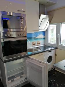 A kitchen or kitchenette at TOTANI LUX