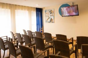 TV a/nebo společenská místnost v ubytování Hotel Scacciapensieri