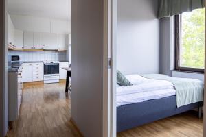Kuchyň nebo kuchyňský kout v ubytování Hotel B&B Gränden