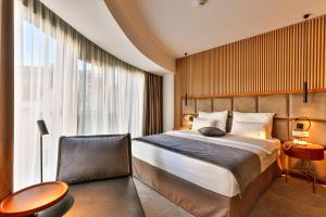 Postel nebo postele na pokoji v ubytování Hotel Fagus by Aycon