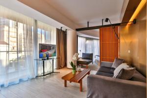TV a/nebo společenská místnost v ubytování Hotel Fagus by Aycon