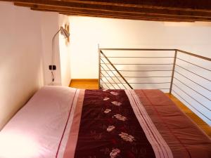 Ένα ή περισσότερα κρεβάτια σε δωμάτιο στο CASA VACANZE ROBY