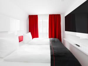 Ένα ή περισσότερα κρεβάτια σε δωμάτιο στο Hotel Andante Rust