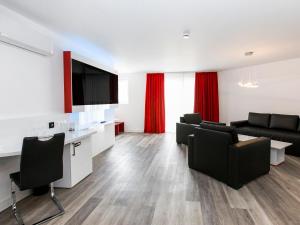 Μια τηλεόραση ή/και κέντρο ψυχαγωγίας στο Hotel Andante Rust