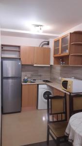 Kuchyň nebo kuchyňský kout v ubytování Sea Bedroom Apartments