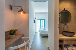 A bed or beds in a room at Livikon by the Sea
