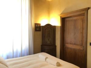 Posteľ alebo postele v izbe v ubytovaní Garibaldi Suite