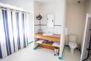 a bathroom with a sink and a toilet at Mary Boat Trip in Ile aux Moines
