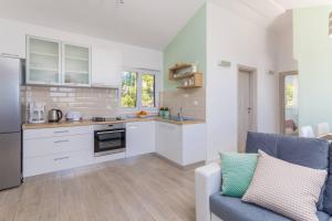 Кухня или мини-кухня в Apartments Silvana

