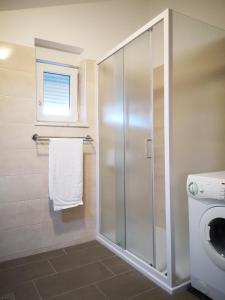 Koupelna v ubytování Apartmani Alavuk