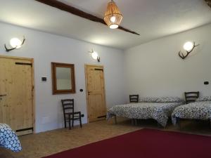 Postel nebo postele na pokoji v ubytování Cantina Alpina