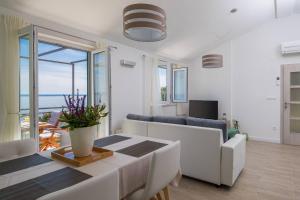 Телевизор и/или развлекательный центр в Apartments Silvana