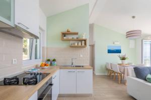 Кухня или мини-кухня в Apartments Silvana
