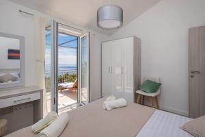 Кровать или кровати в номере Apartments Silvana