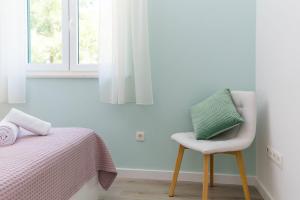 Кровать или кровати в номере Apartments Silvana